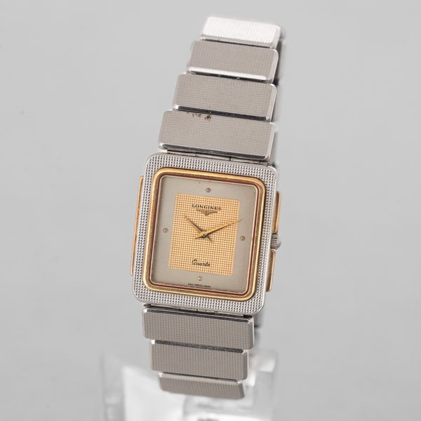 LONGINES : Longines Forma in acciaio con inserti in oro, quadrante argento, movimento al quarzo, bracciale in acciaio, 26x28 mm, 1970 circa  - Asta Orologi da Polso - Associazione Nazionale - Case d'Asta italiane