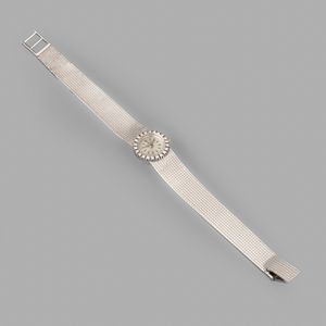 Baume & Mercier : Baume & Mercier Lady in oro bianco 18k, quadrante Argent, brillanti, indici applicati, bracciale integrato, carica manuale, 15,5 mm  - Asta Orologi da Polso - Associazione Nazionale - Case d'Asta italiane