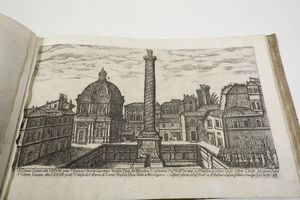 Aloisio Giovannoli (Civita Castellana, ca. 1550 - Roma, 1618)<BR>Roma, 1750 (?) Vedute degli antichi vestigj di Roma di Alo Giovannoli in due parti. La prima contiene mausolei, archi, colonne, e fabbriche pubbliche, la seconda rappresenta terme, anfiteatri, teatri e tempj. Comprese in rami 106. Parte prima <BR>Frontespizio incollato su carta non coeva e privo del bordo inferiore con possibile mancanza di testo, restaura all'angolo inferiore della tavola n. 5, gore d'acqua al bordo inferiore di alcune tavole, foxing diffuso soprattutto sulle tavole della prima parte, insignificante strappo marginali, tracce di tarlo nelle sguardie nell'ultima bianca e nelle ultime due tavole.<BR>Legatura in mezza pergamena, cm 26,5x40,5  - Asta Stampe - Associazione Nazionale - Case d'Asta italiane