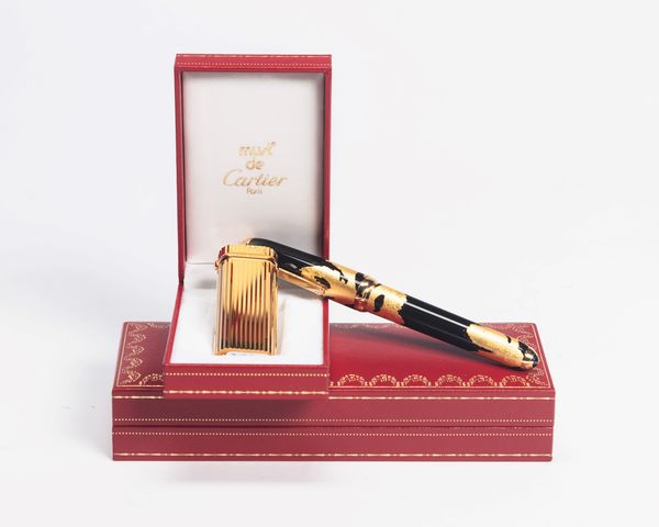 CARTIER : Lotto composto da una penna e un accendino  - Asta Luxury Fashion - Associazione Nazionale - Case d'Asta italiane