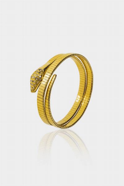 BRACCIALE : Peso gr 48 5 rigido  in oro giallo  a forma di serpente con testa in diamanti taglio 8/8 per totali ct 0 40 ca  - Asta Gioielli  - Associazione Nazionale - Case d'Asta italiane