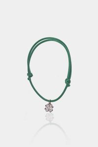 BRACCIALE - Peso lordo gr 1 5 con struttura in tessuto verde e ciondolo in oro bianco a forma di quadrifoglio con diamanti  [..]