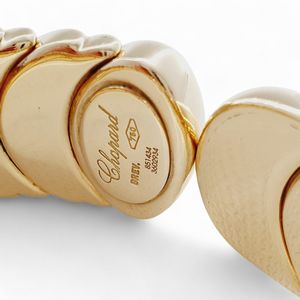 CHOPARD : Bracciale semi-rigido in oro  - Asta Gioielli e Argenti del XX secolo, con una selezione di Orologi da polso e Penne da collezione - Associazione Nazionale - Case d'Asta italiane