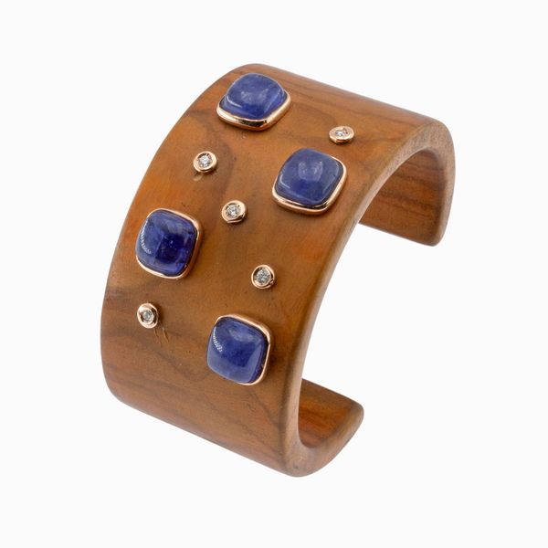 Bracciale a manetta in ebano tanzanite e diamanti  - Asta Gioielli Orologi e Fashion Vintage Web Only - Associazione Nazionale - Case d'Asta italiane