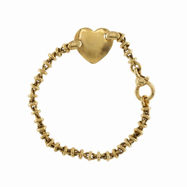 Bracciale in oro giallo 18kt con cuore  - Asta Gioielli Orologi e Fashion Vintage Web Only - Associazione Nazionale - Case d'Asta italiane