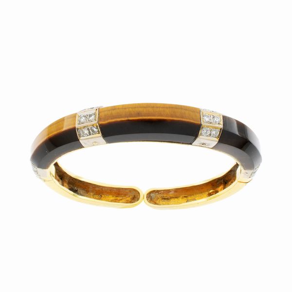 Bracciale a manetta in oro a due colori 18kt  - Asta Gioielli e Orologi - Associazione Nazionale - Case d'Asta italiane