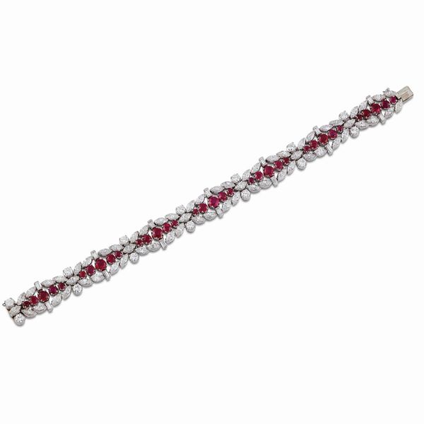 BRACCIALE A FASCIA CON RUBINI E DIAMANTI  - Asta GIOIELLI - Associazione Nazionale - Case d'Asta italiane