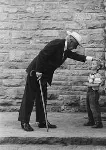 Tony Vaccaro - Frank LLoyd Wright caressing a child