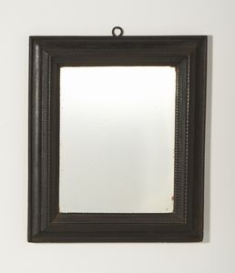 MANIFATTURA DEL XVII-XVIII SECOLO - Cornice in legno ebanizzato con specchio