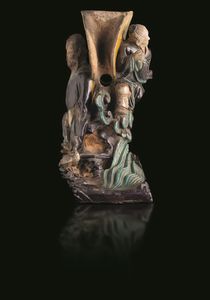 Portacandele in Fahua bifacciale raffigurante due immortali in grès, Cina, Dinastia Ming, XVII secolo  - Asta Fine Asian Works of Art - Associazione Nazionale - Case d'Asta italiane