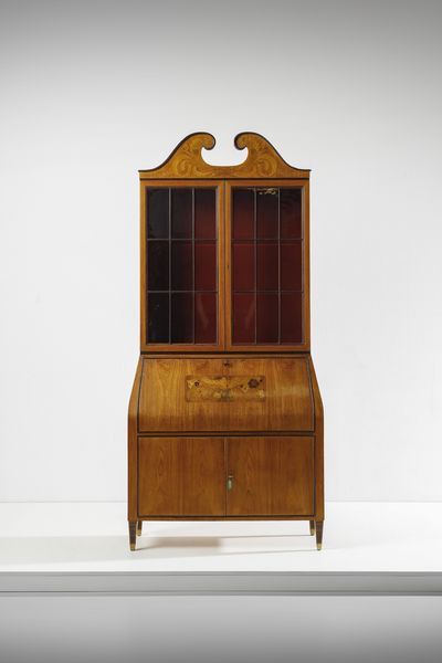 PAOLO BUFFA : Trumeau con base a due ante a battente, ribalta e alzata a vetrina terminante a cimasa, esecuzione Serafino Arrighi, Cantù .  - Asta Asta 503 | DESIGN E ARTI DECORATIVE DEL NOVECENTO Virtuale - Associazione Nazionale - Case d'Asta italiane