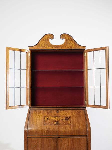 PAOLO BUFFA : Trumeau con base a due ante a battente, ribalta e alzata a vetrina terminante a cimasa, esecuzione Serafino Arrighi, Cantù .  - Asta Asta 503 | DESIGN E ARTI DECORATIVE DEL NOVECENTO Virtuale - Associazione Nazionale - Case d'Asta italiane