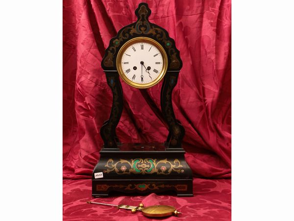 Grande orologio da tavolo in legno ebanizzato  - Asta Due case fiorentine - Associazione Nazionale - Case d'Asta italiane
