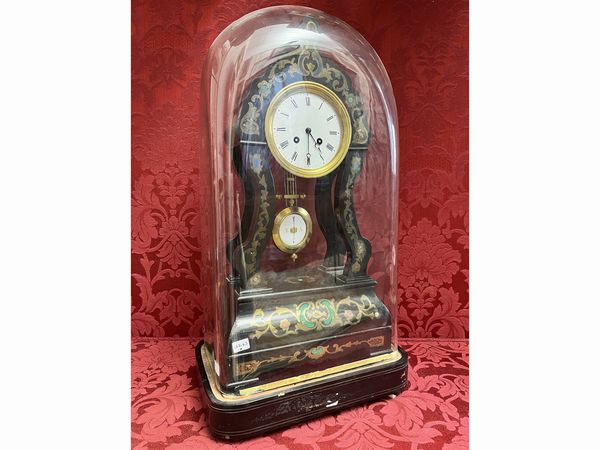 Grande orologio da tavolo in legno ebanizzato  - Asta Due case fiorentine - Associazione Nazionale - Case d'Asta italiane