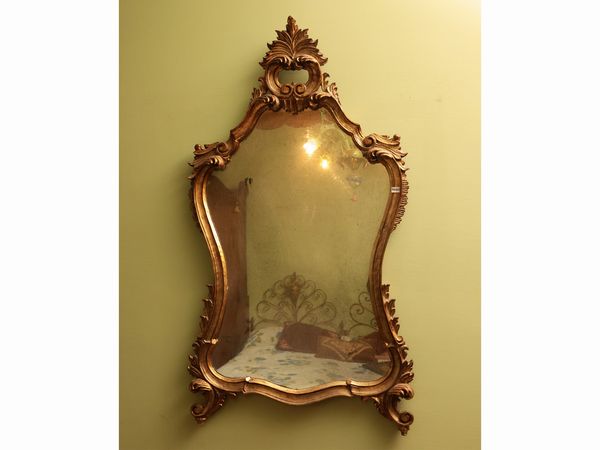 Specchiera con cornice in legno intagliato e dorato  - Asta Due case fiorentine - Associazione Nazionale - Case d'Asta italiane