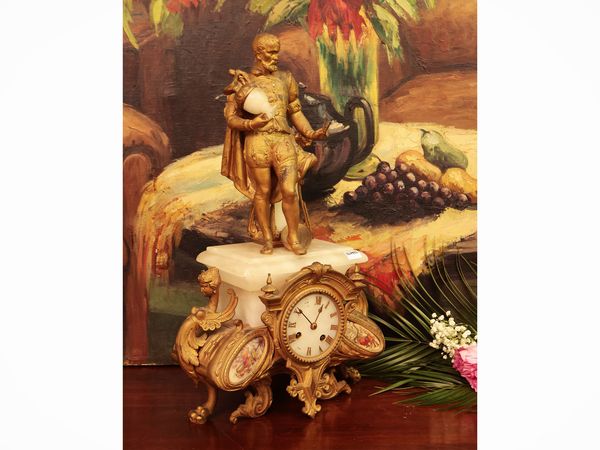 Orologio da tavolo in metallo dorato e onice  - Asta Due case fiorentine - Associazione Nazionale - Case d'Asta italiane