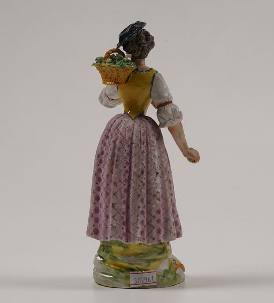 Figurina di contadina.<BR>Probabilmente Veneto, verso la fine del XVIII secolo.  - Asta Maioliche e Porcellane - Associazione Nazionale - Case d'Asta italiane