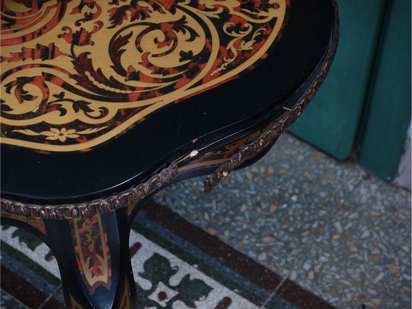 Tavolino basso in legno ebanizzato in stile Boulle  - Asta Dimore fiorentine - Associazione Nazionale - Case d'Asta italiane