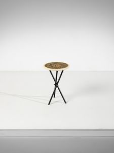 FORNASETTI PIERO (1913 - 1988) - Tavolino occasionale con decoro Sole Ricciuto o Re Sole, Milano