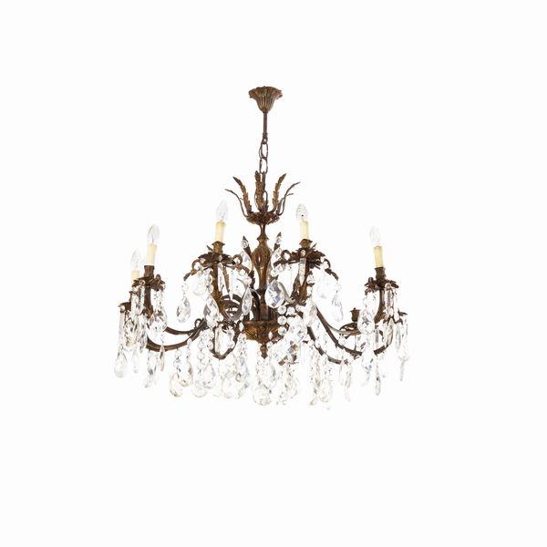 Lampadario a 12 luci in ottone e cristalli  - Asta Antiquariato - Associazione Nazionale - Case d'Asta italiane