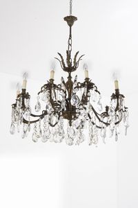 Lampadario a 12 luci in ottone e cristalli  - Asta Antiquariato - Associazione Nazionale - Case d'Asta italiane