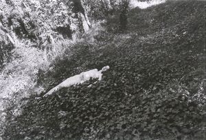 Ferdinando Scianna - Woman sleeping in the woods. Lerici, Italy