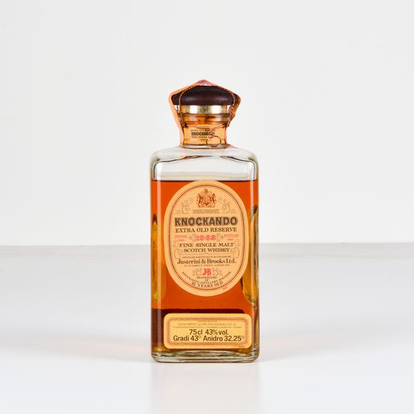 Knockando, Justerini & Brooks, Fine Single Malt Scotch Whisky Extra Old Reserve  - Asta Heritage. Vini e Distillati da Collezione - Associazione Nazionale - Case d'Asta italiane