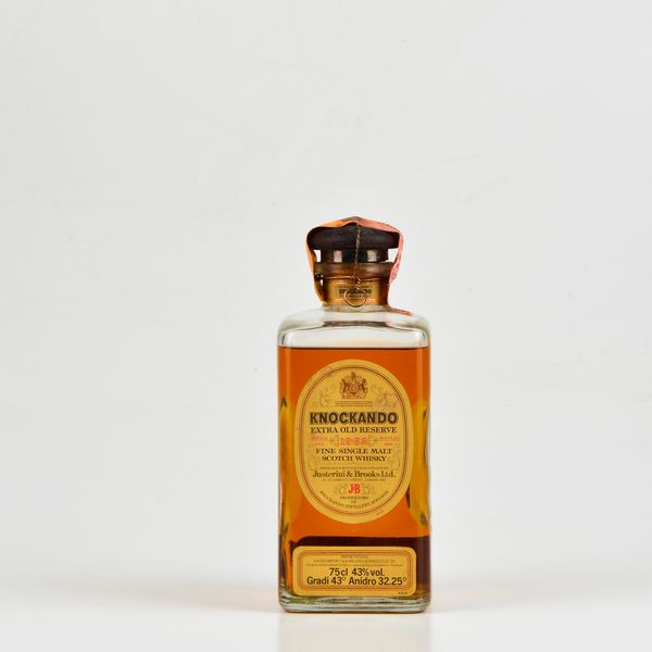 Knockando, Justerini & Brooks, Fine Single Malt Scotch Whisky Extra Old Reserve  - Asta Heritage. Vini e Distillati da Collezione - Associazione Nazionale - Case d'Asta italiane