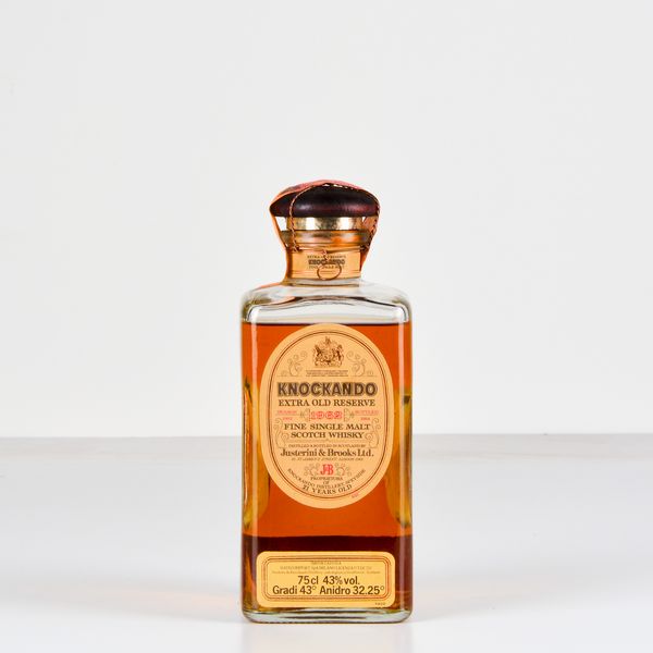 Knockando, Justerini & Brooks, Fine Single Malt Scotch Whisky Extra Old Reserve  - Asta Heritage. Vini e Distillati da Collezione - Associazione Nazionale - Case d'Asta italiane