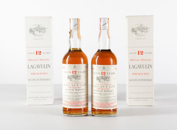 Lagavulin, White Horse Distillers, Pure Islay Malt Scotch Whisky 12 years old  - Asta Heritage. Vini e Distillati da Collezione - Associazione Nazionale - Case d'Asta italiane