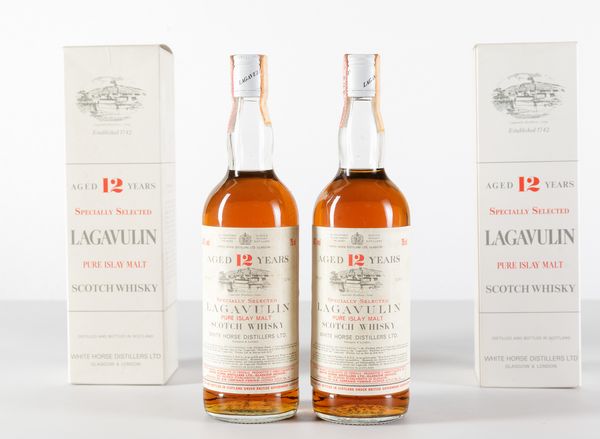 Lagavulin, White Horse Distillers, Pure Islay Malt Scotch Whisky 12 years old  - Asta Heritage. Vini e Distillati da Collezione - Associazione Nazionale - Case d'Asta italiane