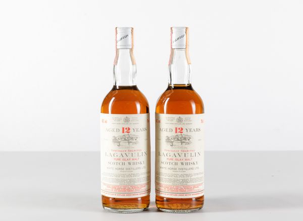 Lagavulin, White Horse Distillers, Pure Islay Malt Scotch Whisky 12 years old  - Asta Heritage. Vini e Distillati da Collezione - Associazione Nazionale - Case d'Asta italiane