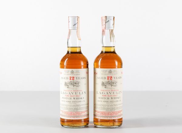 Lagavulin, White Horse Distillers, Pure Islay Malt Scotch Whisky 12 years old  - Asta Heritage. Vini e Distillati da Collezione - Associazione Nazionale - Case d'Asta italiane