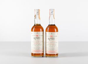 Lagavulin, White Horse Distillers, Pure Islay Malt Scotch Whisky 12 years old  - Asta Heritage. Vini e Distillati da Collezione - Associazione Nazionale - Case d'Asta italiane