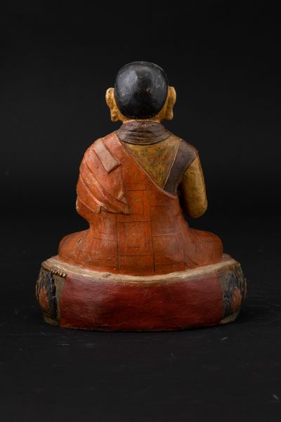 Figura di monaco seduto su fiore di loto in legno laccato, Tibet, XVIII secolo  - Asta Fine Chinese Works of Art - Associazione Nazionale - Case d'Asta italiane