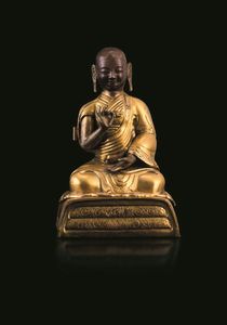 Figura di monaco in bronzo dorato, Tibet, XIX secolo  - Asta Fine Chinese Works of Art - Associazione Nazionale - Case d'Asta italiane