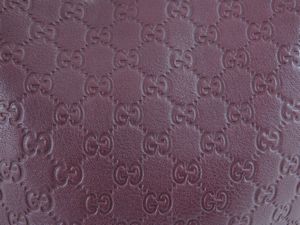 Borsa a spalla in pelle bordeaux, Gucci  - Asta Fashion Vintage e Bijoux / Un guardaroba maschile - Associazione Nazionale - Case d'Asta italiane