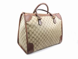 Borsa in tela monogram e pelle di cinghiale marrone, Gucci  - Asta Fashion Vintage e Bijoux / Un guardaroba maschile - Associazione Nazionale - Case d'Asta italiane