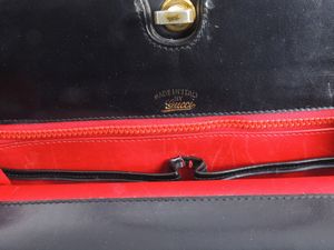 Borsa a mano in pelle nera, Gucci  - Asta Fashion Vintage e Bijoux / Un guardaroba maschile - Associazione Nazionale - Case d'Asta italiane