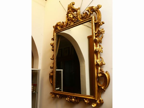 Specchiera in legno intagliato e dorato  - Asta Arredi, argenti, dipinti e curiosit d'epoca in parte provenienti da Villa Mannelli - Associazione Nazionale - Case d'Asta italiane