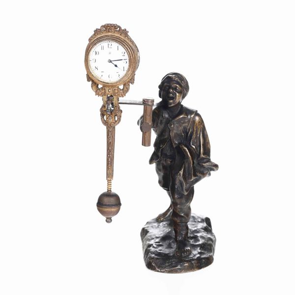 Orologio in bronzo patinato e metallo dorato. Italia 1930-1940  - Asta Antiquariato Aprile | Cambi Time - Associazione Nazionale - Case d'Asta italiane