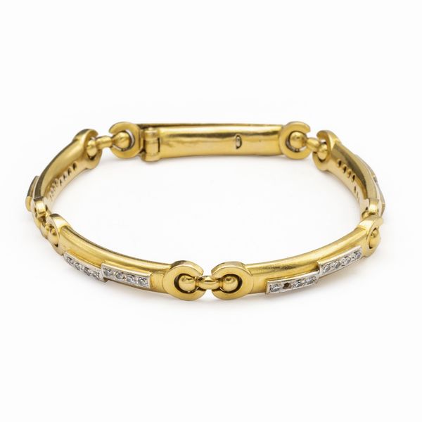 Bracciale in oro giallo e bianco 18kt  - Asta Gioielli Orologi Fashion Vintage - Associazione Nazionale - Case d'Asta italiane